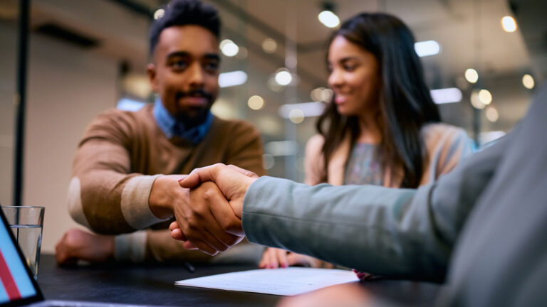 join two professionals shaking hands